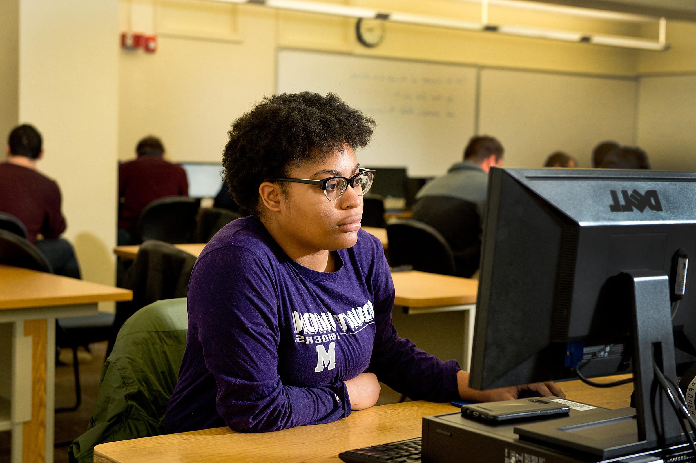 student on computer